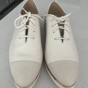 Women's COLE HAAN GRAND AMBITION sneakers.